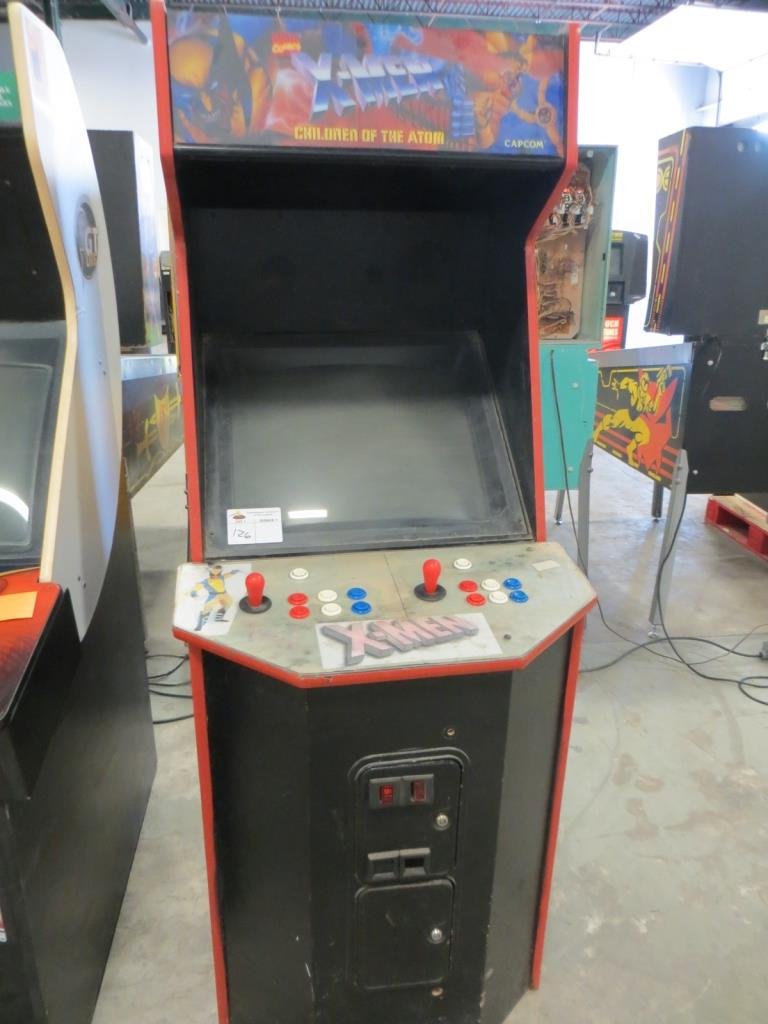 X-MEN: Used item. Powers up unless otherwise noted: Does power and complete but no game play. Possibly a bad connection or board.