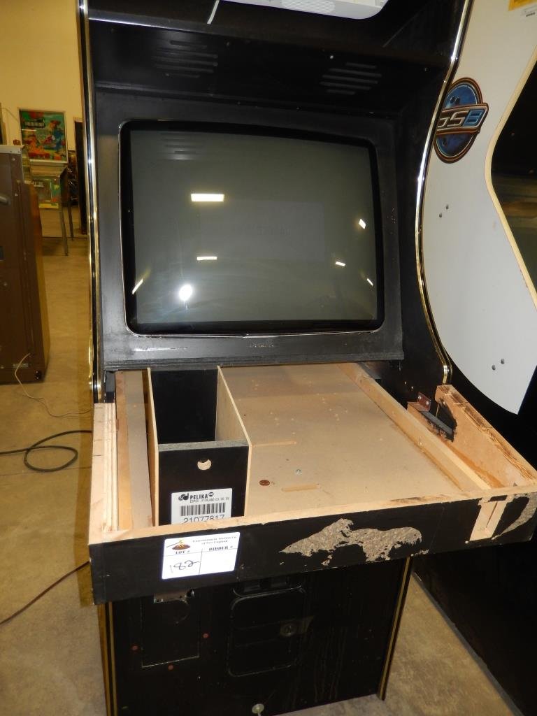 EMPTY CABINET WITH MONITOR: Used item. Powers up unless otherwise noted: No computer or PCB, monitor DOES power up