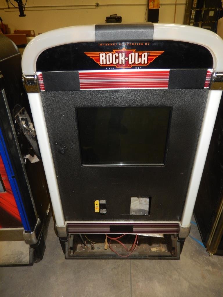 ROCK-OLA JUKEBOX: Used item. Powers up unless otherwise noted: Non-working. Parts machine.