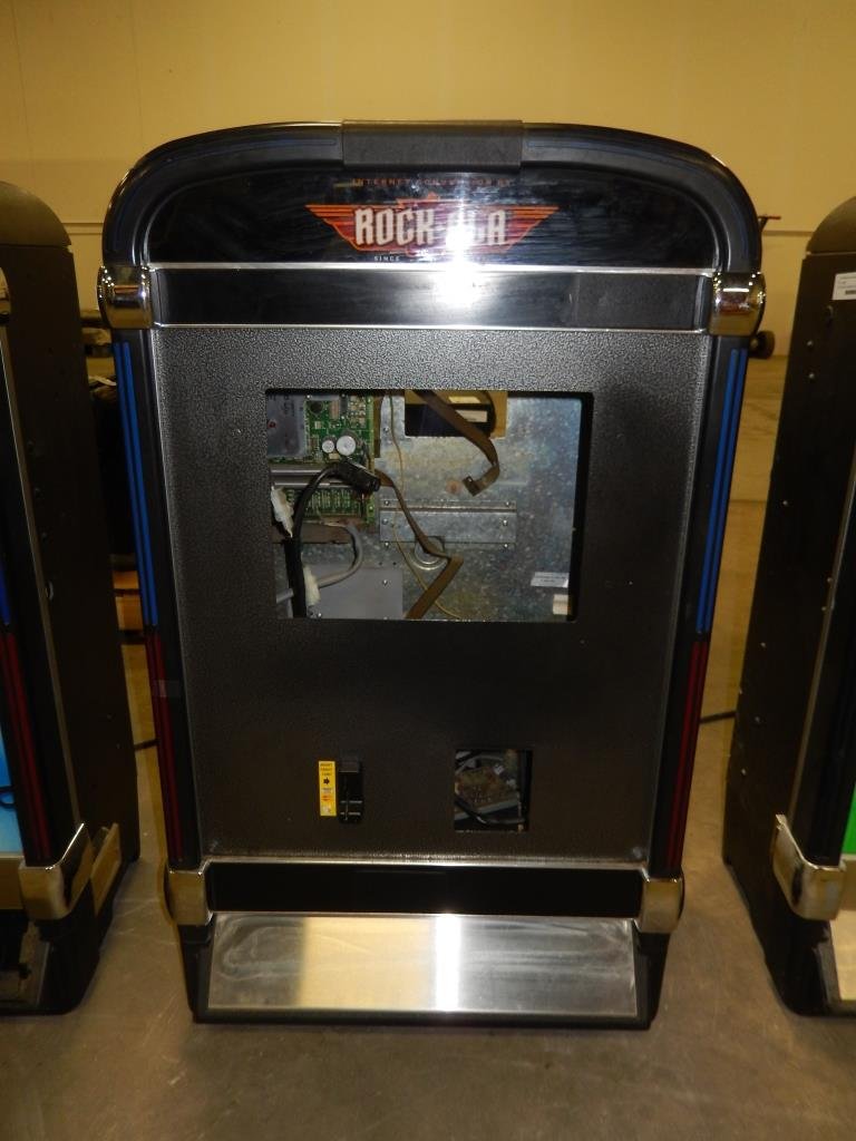ROCK-OLA WALL JUKEBOX - SHELL: Used item. Powers up unless otherwise noted: Shell only. Parts machine.