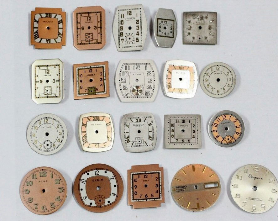 Lot of 20 Watch Dials New Old Stock NOS Bulova Elgin: A nice lot of dials, most appear to be New Old Stock and would be great for mid size watches. Very clean. No Buyers Premium