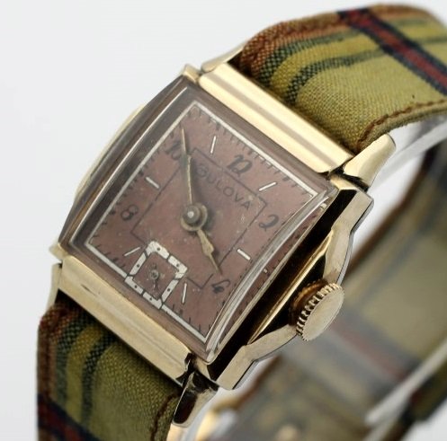 Bulova Vintage Wind Up Mens Watch: The watch is NOT currently running. Measures Measures 24mm across (without crown) and 32mm top to bottom. Watches (if running) have not been timed for accuracy. No Buyers Premium