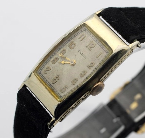 Elgin VIntage Mens Wind Up Watch: The watch is running and ready to wear. Measures 21mm across (without crown) and 38mm top to bottom. Watches (if running) have not been timed for accuracy. No Buyers Premium