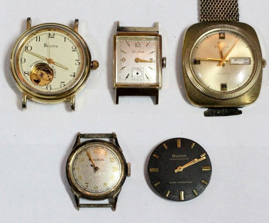 Lot of 5 Bulova Vintage Automatic Mens Watches and Dial: 4 complete watches (one is missing a crystal) and 1 watch dial only. All are currently NOT running. Teh largest watch is 35mm across. No Buyers Premium