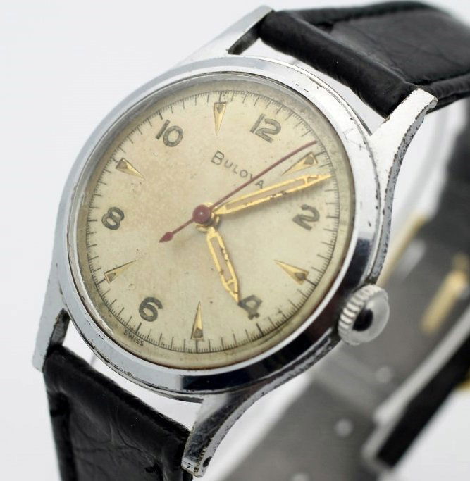 Bulova Mens Wind Up Clean Vintage Watch: The watch is running and ready to wear. Measures 30mm across (without crown) and 39mm top to bottom. Watches (if running) have not been timed for accuracy. No Buyers Premium