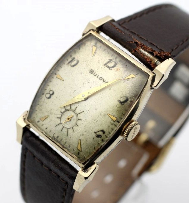 Circa 1953 BULOVA 17 Jewel Art Deco Men's Watch: Men's 10 Karat Rolled Gold Plate 25mm BULOVA. Calibre 10BT. Recently Added Leather Strap. Watch Is Currently In Working Order. No Buyers Premium.