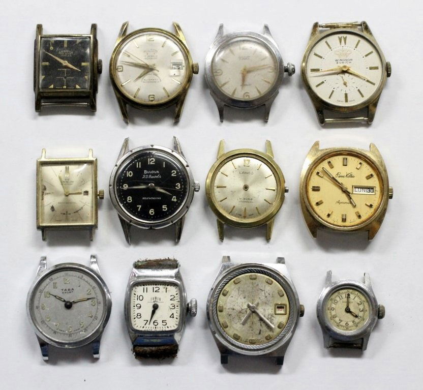 Vintage Men's Watch Lot Of 12 BULOVA GENEVA PIERRE: Men's Wrist Watch Lot OF 12. All Watches Are Not Running And Are Being Sold For Parts Or Repair. Various Shapes And Sizes. No Buyers Premium.