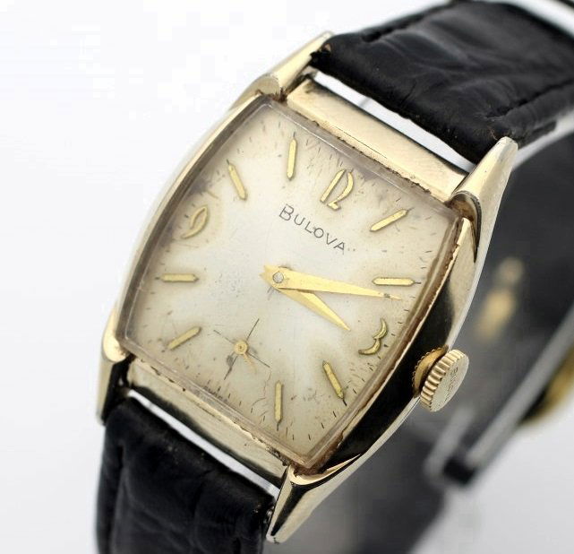 Circa 1951 BULOVA 10 Karat Rolled Gold Plate Watch: Men's 10K Rolled Gold Plate 28mm BULOVA. Calibre 11AL 17 Jewel Movement. Watch Is Currently In Working Order. No Buyers Premium.
