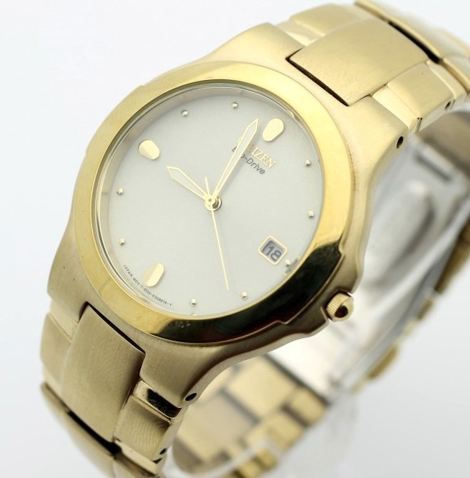 CITIZEN Eco-Drive Men's Gold Tone Watch: Men's Stainless Steel 36mm CITIZEN With Stainless Band. Reference E111. Modern Style. Watch IS Currently Running. No Buyers Premium.
