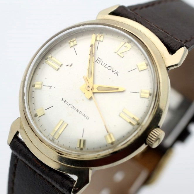 Circa 1966 BULOVA Automatic 10k GF Men's Dress Watch: Men's 10 Karat Gold Filled 33mm BULOVA With Leather Strap. Calibre 11ALAC 17 Jewel Movement. Water Proof Case. Watch Is Currently Working. No Buyers Premium.