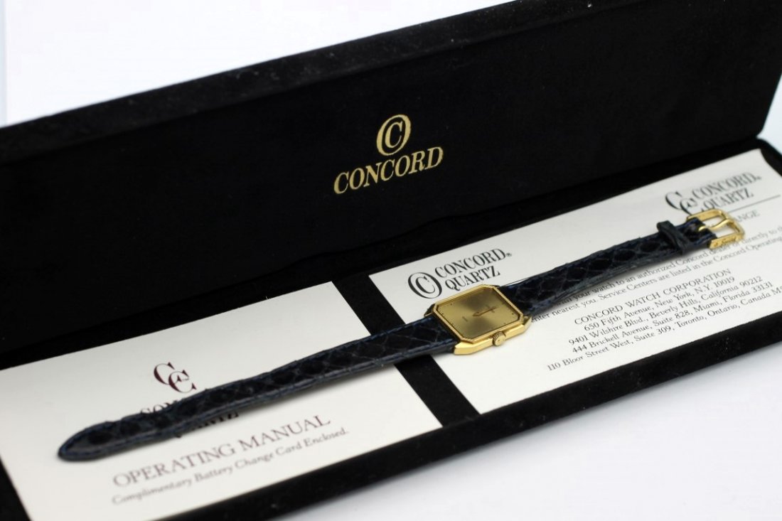 CONCORD San Remo Swiss Quartz Ref. 17 61 668 Women's: Women's Gold Plaque 19mm CONCORD With Snakeskin Strap. Reference 17 61 668. Watch Is Currently Not Running. Includes Box And Operating Manual As Well As A Free Service Card From Concord. No Buyers Pre