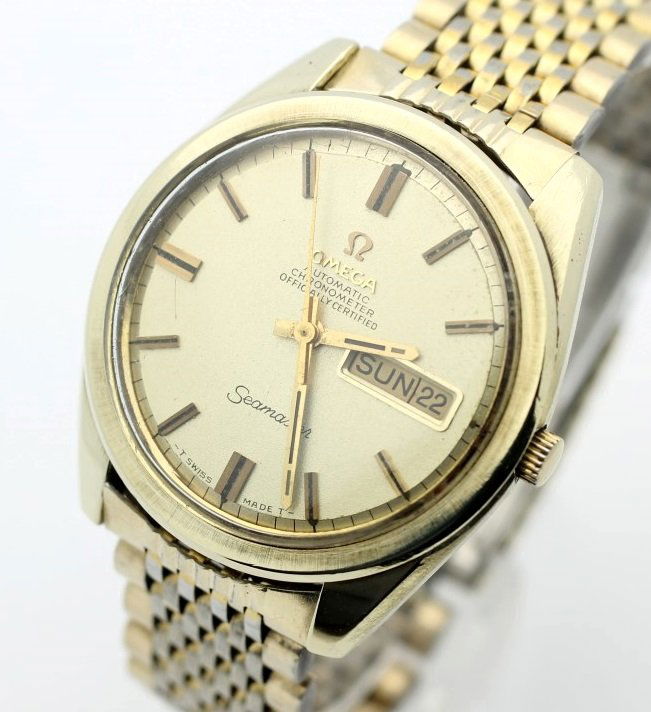 Circa 1970 OMEGA Day Date Seamaster Ref. 166.032 Cal.: Men's 14 Karat Gold Capped 36.5mm OMEGA With Omega 1/40 10 Karat Gold Overlay Band. Circa 1970's. Reference 166.032 Cal. 751 Automatic Chronometer Oficially Certified. Watch IS Currently In Working Or