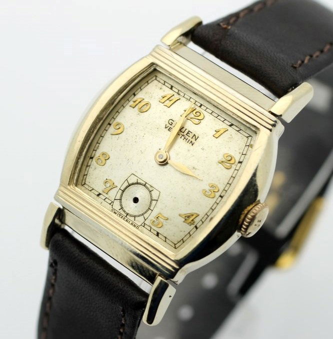 Vintage GRUEN Veri-Thin Hand Wind Men's Dress Watch: Men's 10 Karat Gold Filled 27.5mm GRUEN With Leather Strap. Calibre 421 Hand wind 15 Jewel Movement. Watch Is Currently NOT In Working Order. No Buyers Premium.