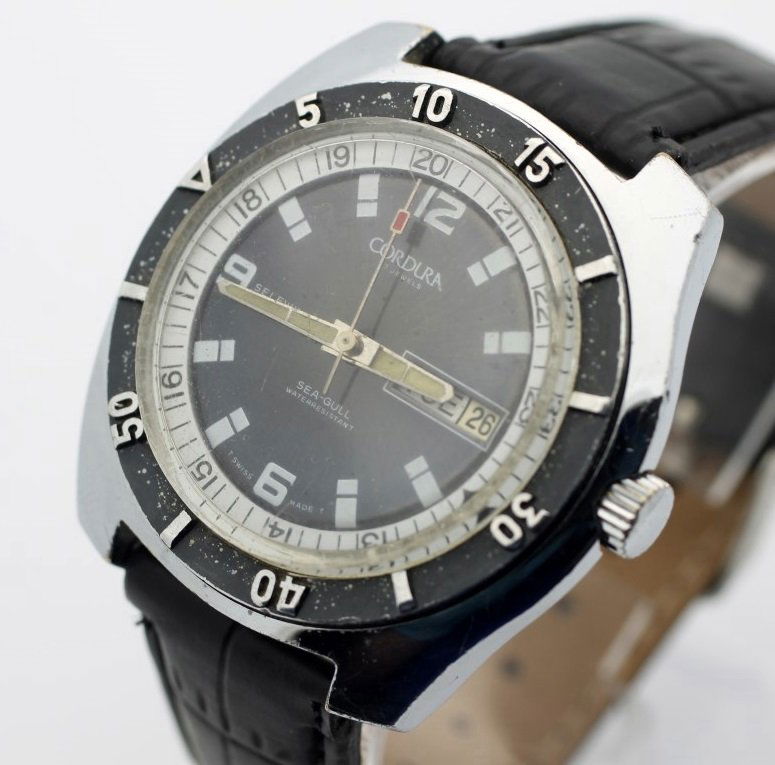 Vintage CORDURA By SICURA "Sea-Gull" Automatic Diver's: Men's Base Metal 42mm CORDURA By SICURA (Breitling) With Leather Strap. Circa 1970's. When Wound Seconds Hand Will Spin Rapidly. With A Little TLC This Can Be A Beautiful Diver's Piece. No Buyers Prem