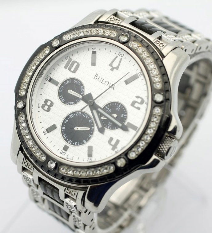 BULOVA Swarovski Crystal Ceramic Men's Dress Watch: Men's Stainless Steel/Ceramic 44mm Bulova. Reference 98C005. Quartz Movement. Watch Is Currently In Working ORder. No Buyers Premium.
