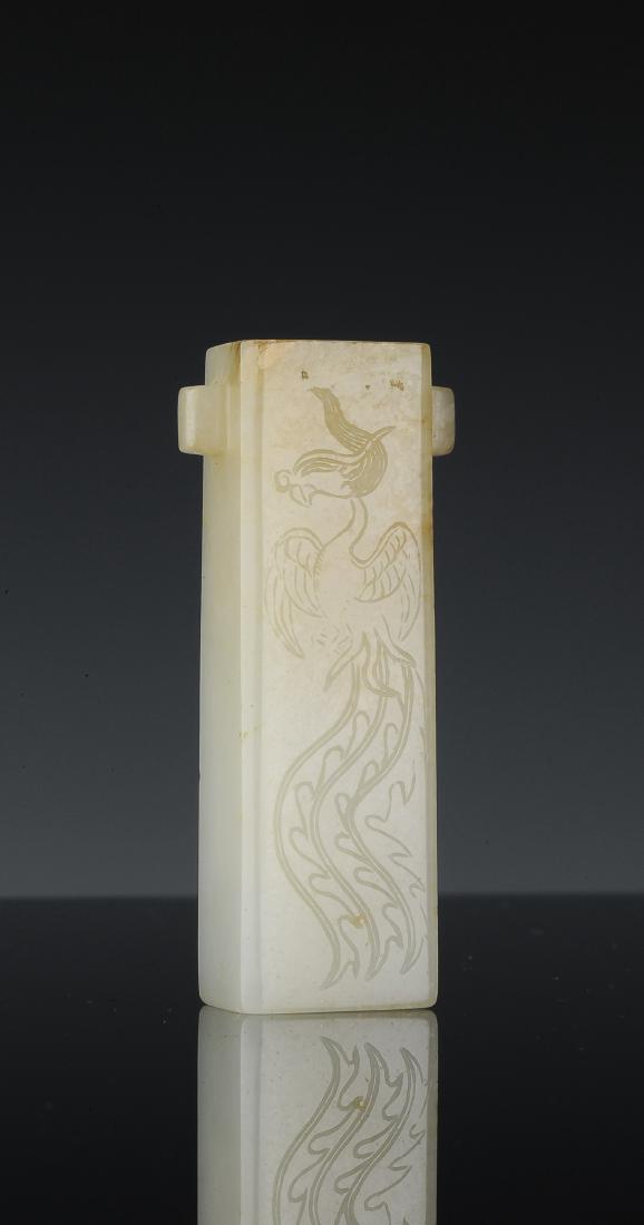 Carved Jade Incense Holder, Early Ming Dynasty: Small jade incense holder from the early Ming dynasty. This carved jade is in the form of a square tube with open top for holding the incense. Two sides of the incense holder are incised with phoenix 