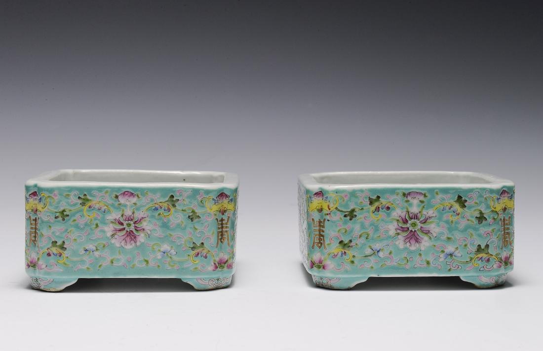 Pair of Square Famille Rose Brush Washers: Pair of square famille rose brush washers. The brush washers have white ground interiors and turquoise ground exteriors. The bodies are painted with lotus flower motifs and each of the corners has a s