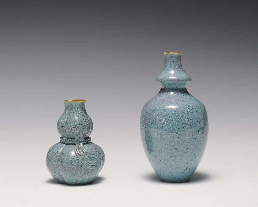 Two Robin's Egg Blue Vases, 19th - 20th Century: Two robin's egg blue glazed vases from the 19th - 20th century. One vase is in the form of a gourd. It has three mouths and the gourd is separated into three parts. A ribbon wraps around the middle. T