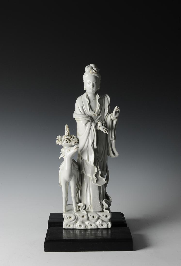 Blanc de Chine Figure, Xu Yun Ling, Early 20th Century: Blanc de chine figure of Guanyin and a deer by Xu Yun Ling from the early 20th century. Th elegant figure of Guanyin is standing, performing a Mudra and holding a lingzhi mushroom in one hand. A deer 
