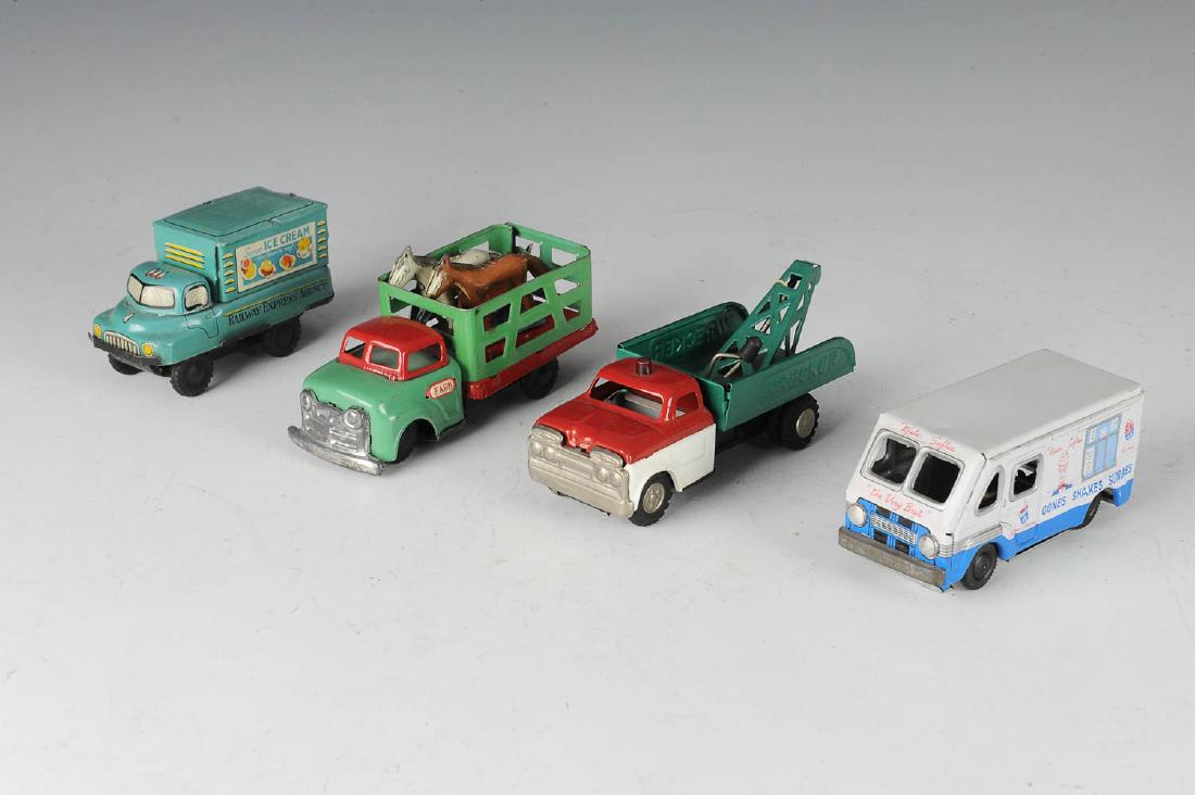 Four Japanese Tin Litho Trucks (1 of 3)