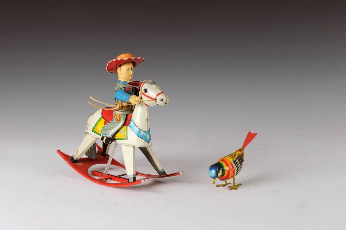 Yonezawa Rocking Cowboy: Tin windup comes with a Kohler pecking bird. Both work fine. Dimensions are: Largest 6 5/8" long. All measurements are approximate.