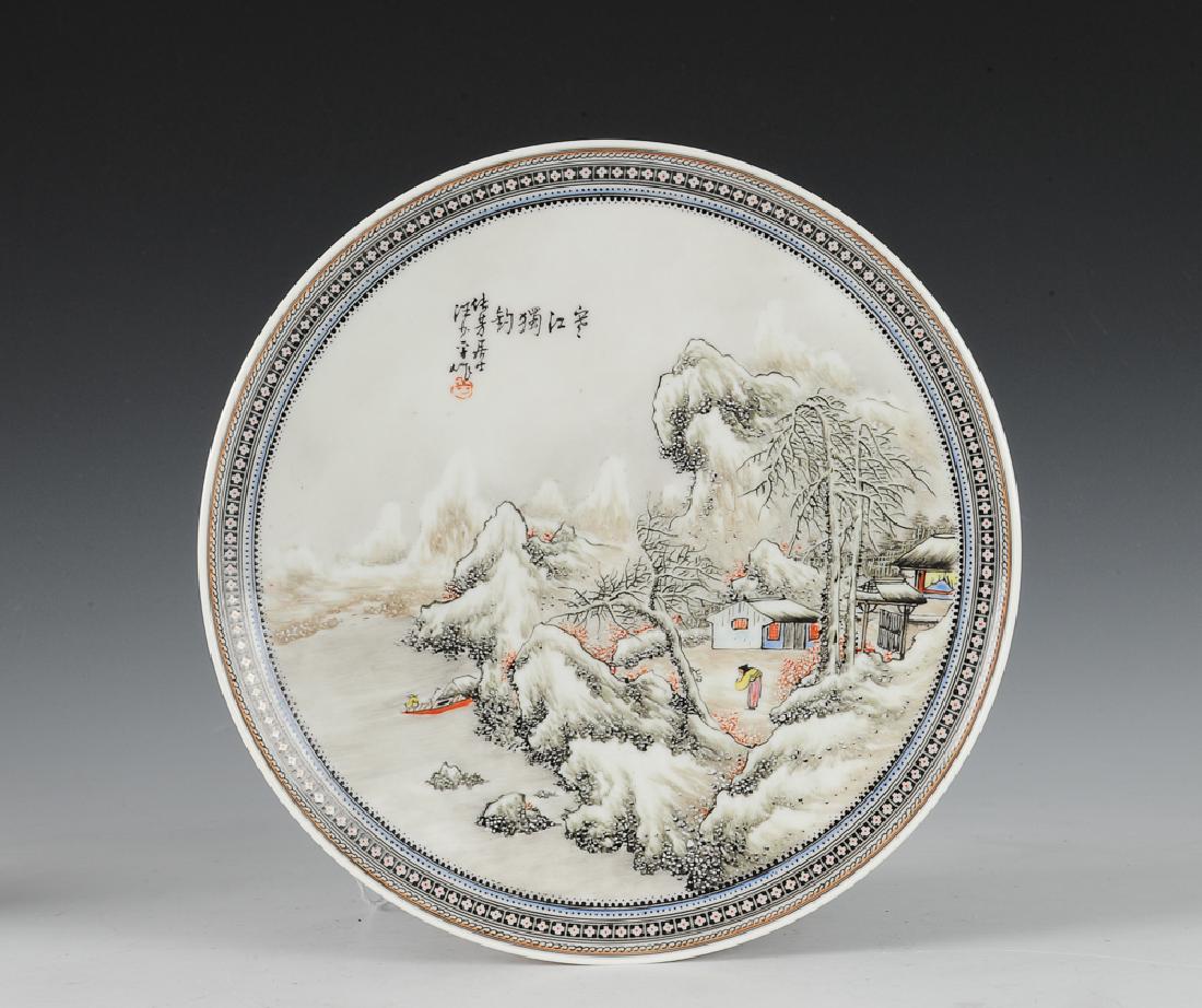 Famille Rose Plate, Wang Xiaoting, Early 20th C: White ground famille rose plate painted by Wang Xiaoting, from the early 20th century. Plate has a decorative geometric border and is painted with a snowy landscape that includes people and buildings.