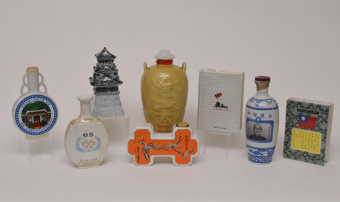 9 Porcelain Liquor Bottles, Taiwan, China Etc.: Group of 9 porcelain, collectors liquor bottles in varying shapes and sizes from China and Taiwan. Some come with original boxes. Dimensions for the largest box are: 11 1/4 inches tall X 6 3/4 inches 