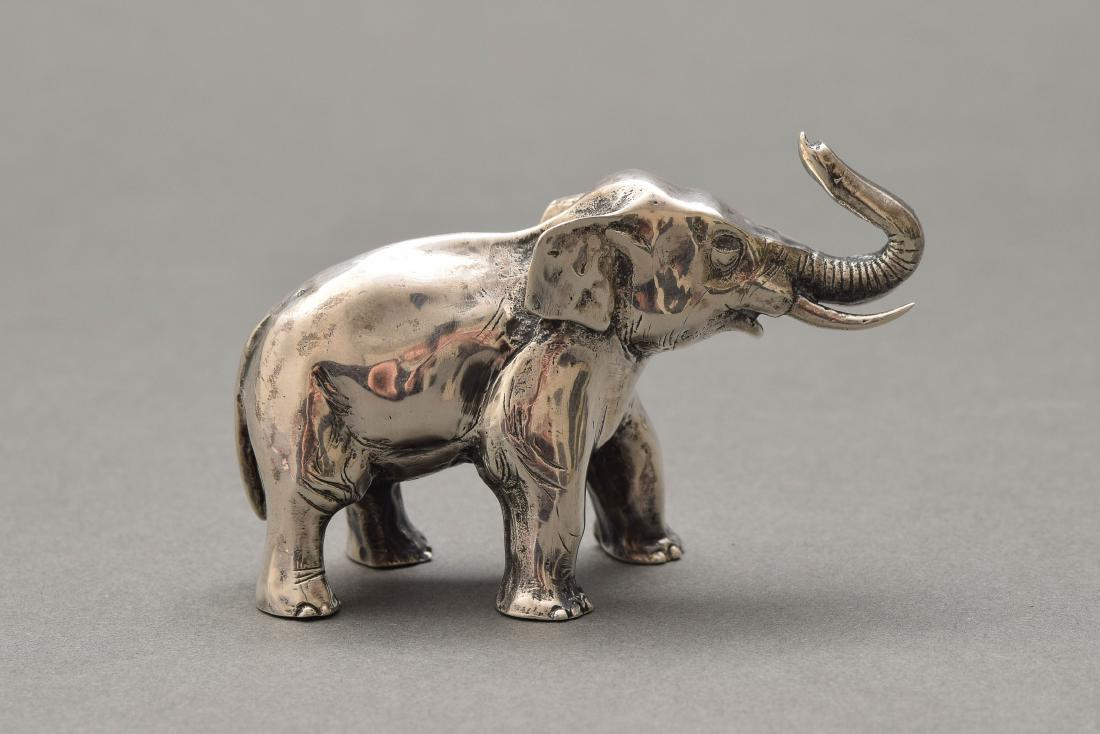 Sterling Elephant, S. Kirk & Son: Solid silver, signed on feet. Total weight: 226 grams. Dimensions are: 3 1/4" long X 2" tall. All measurements are approximate. Condition: Very Fine - Excellent. Provenance: From a collector's e