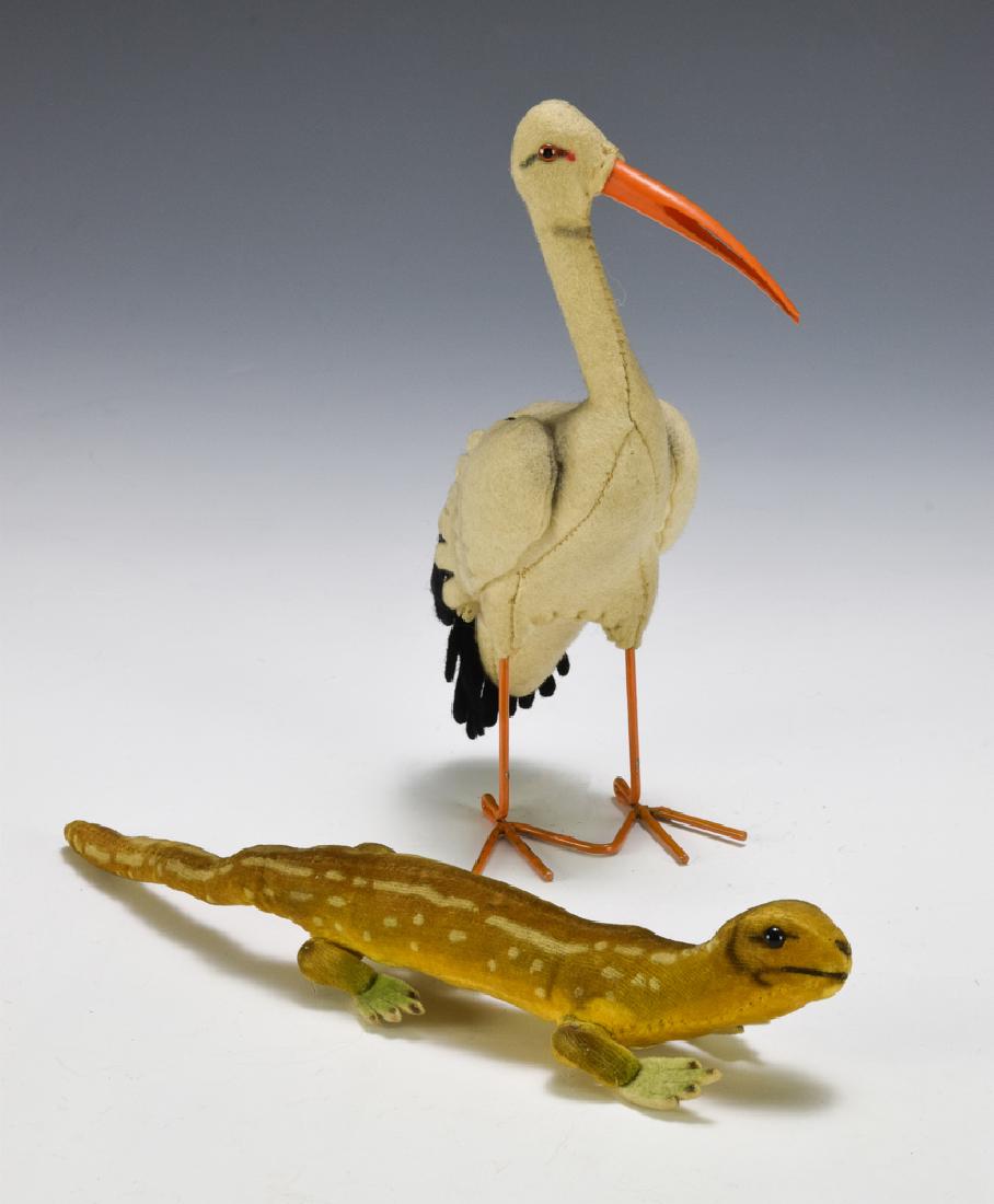 Steiff Stork & Lizard: Stork is missing a tag but was made in US Zone Germany. Dimensions for the largest are: 6 1/2 inches tall X 4 inches wide. All measurements are approximate. Light wear, overall very good, Fine