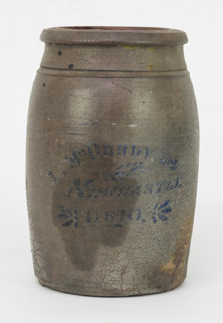 Cobalt-Decorated Salt Glaze Crock by McCurdy: A salt glazed earthenware crock decorated in cobalt glaze with "I. McCurdy, New Castle Ohio". Dimensions are: 10 1/2" tall X 6" wide. All measurements are approximate. Condition: The surface is worn a