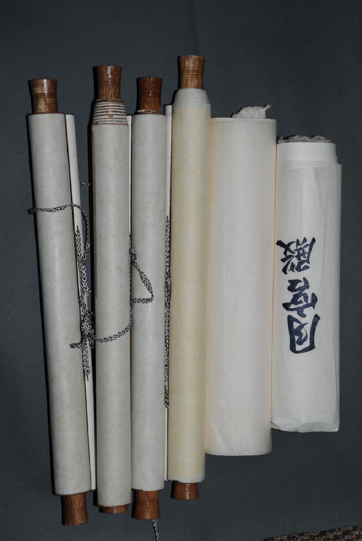 Group of 6 Blank Scrolls, Old Paper: A group of 6 blank scrolls consisting of old paper. The group includes: a pair of scrolls with red paper with gold flecks and wood dowels, a pair of scrolls with orange paper with gold flecks and wood