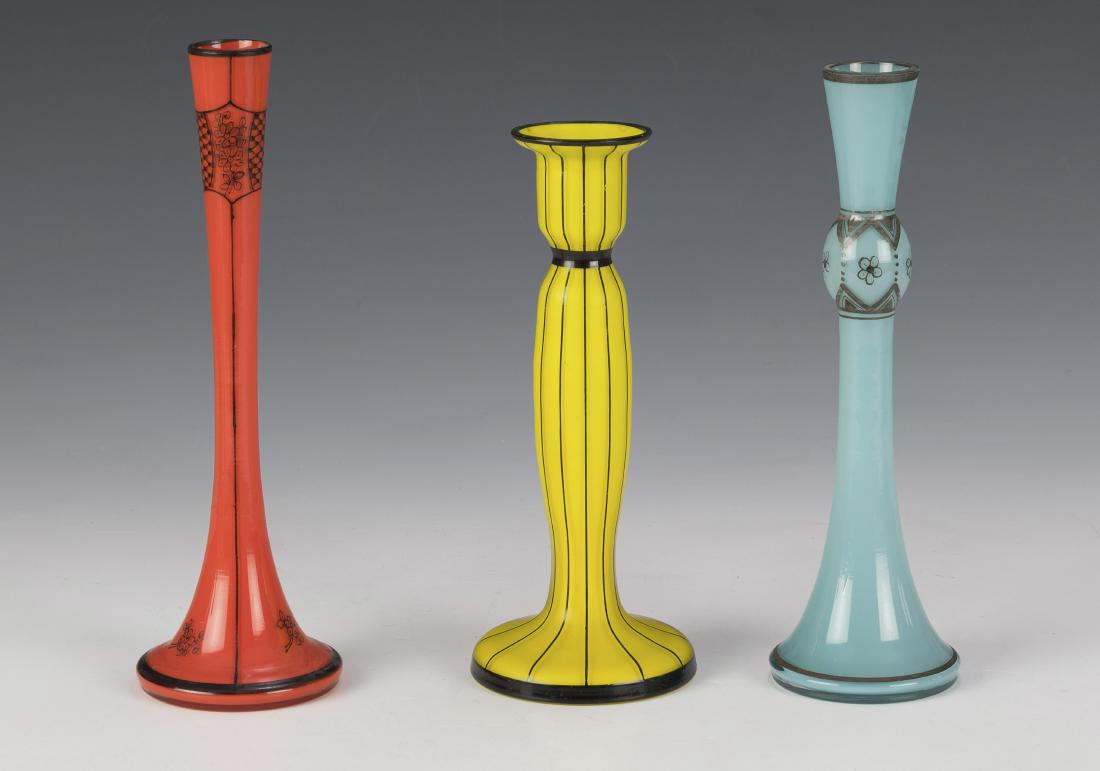 Three Hand Painted Czech Glass Bud Vases: Two with black decoration, one with grey. Dimensions are: largest 8 9/16" tall. All measurements are approximate. Condition: No noted damage. Excellent. Provenance: The lifetime collection of Linda Ra