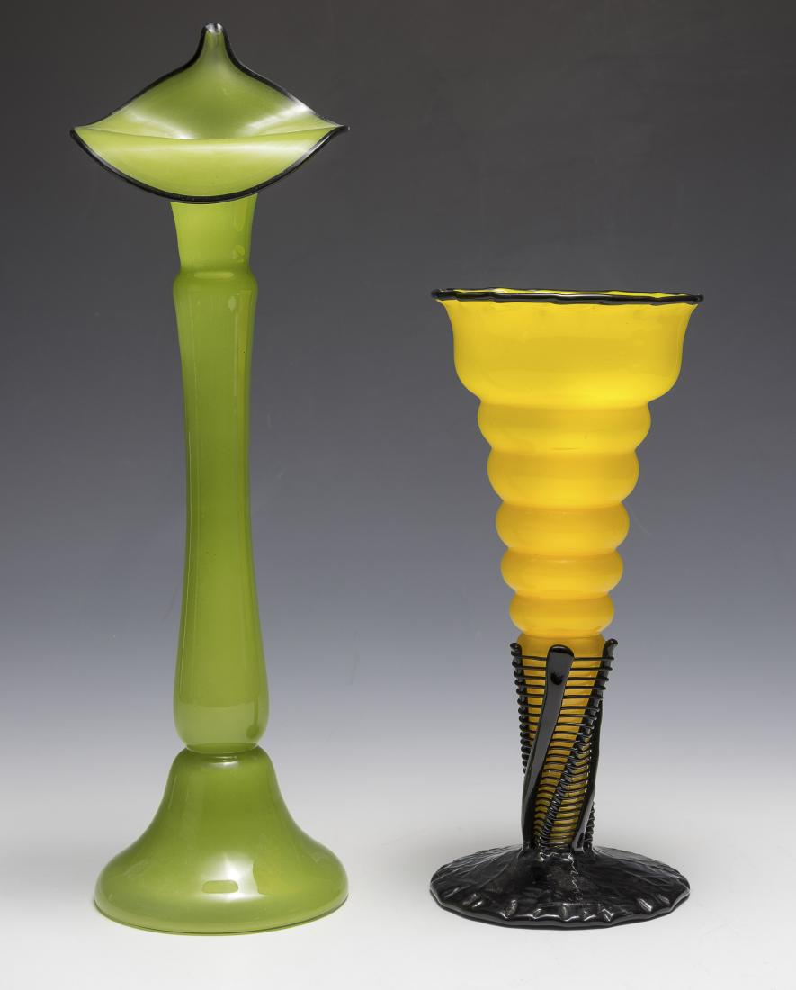 Two Czech Glass Vases: Two Czech glass vases, yellow and green with black trim. Dimensions are: largest 13" tall, 3 3/4" dia. All measurements are approximate. Condition: No noted damage. Excellent. Provenance: The lifetime