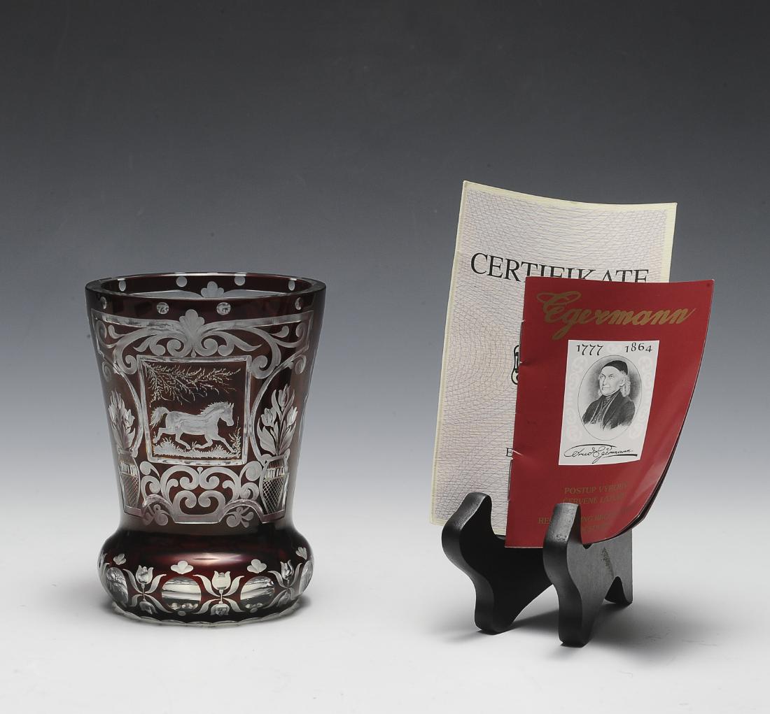 Egermann Ruby Cut Vase by Stephan Benec 1/1: Made in the Czech Republic, baroque designs with horses. Comes with original certificate from 2007 stating that this is one of one by Egermann artist Stephan Benec. Dimensions are: 5" tall, 3 3/4" dia