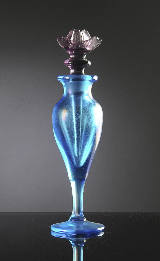 Blue Satin Glass Perfume with Amethyst Stopper: Unsigned Czech perfume bottle. Flower form stopper retains wand. Dimensions are: 5 1/2" X 3 5/8". All measurements are approximate. Flower form stopper retains wand. Dimensions are: 7 1/8" tall. All M