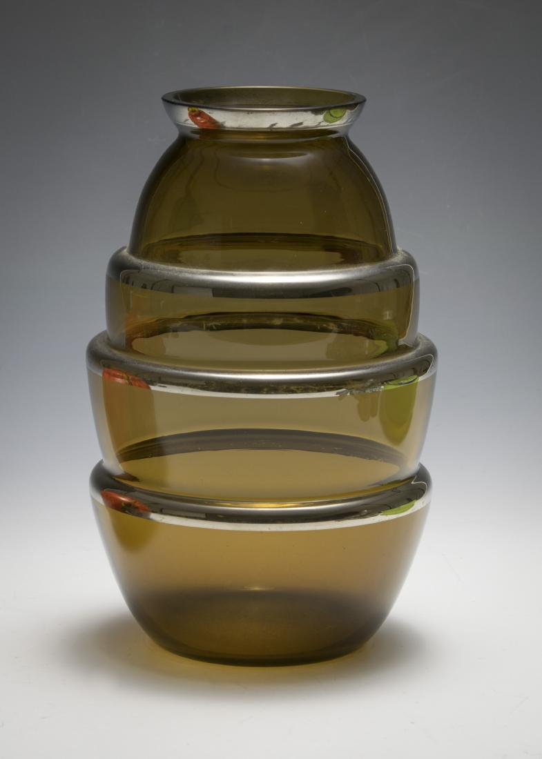 Art Deco Vase with Silver Bands: Nicely designed Art Deco vase is unmarked but possible Czech. Dimensions are: 9" tall, 5 3/8" dia. All measurements are approximate. Condition: Some wear to silver bands, no damage to glass. Fine. Pro