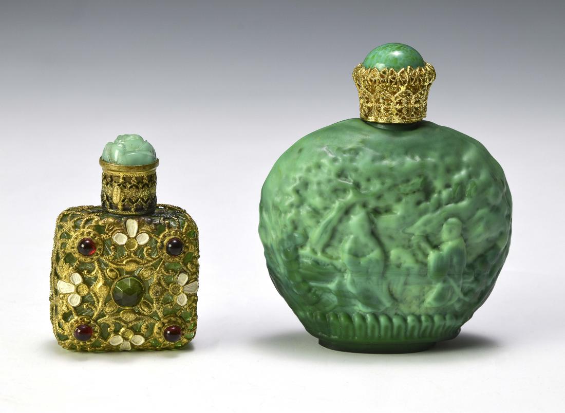 Two Czech Glass Perfumes with Gilt Decoration: Larger is Malachite with Chinese imagery, gilt stopper with cabochon stone and original wand (probably Ingrid or Hoffmann). Small green bottle gas gilt filigree with "gems" and a carved stopper with o