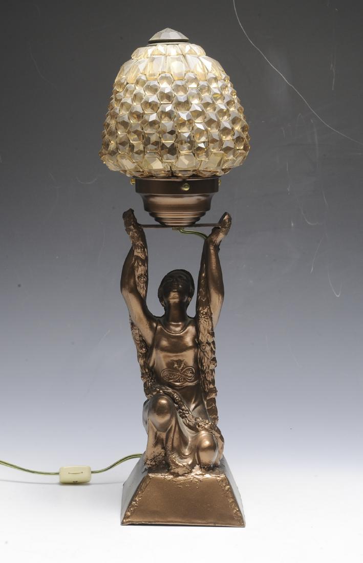Art Deco Spelter Lamp with Czech Crystal Shade: Lamp has a nice light chocolate color facet crystal Czech shade. Woman's figure has an added metal base. Dimensions are: 19 1/2" tall, 6 1/2" long. (Shade is 6 1/2" tall, 6" dia.) All measurements are
