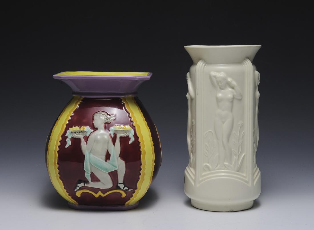 Two Czech Pottery Vases with Nudes: Two Czech pottery vases decorated with nude figures. One vase is all cream-colored and the other is multicolored. Dimensions are: largest 10" tall. All measurements are approximate. Condition: No note