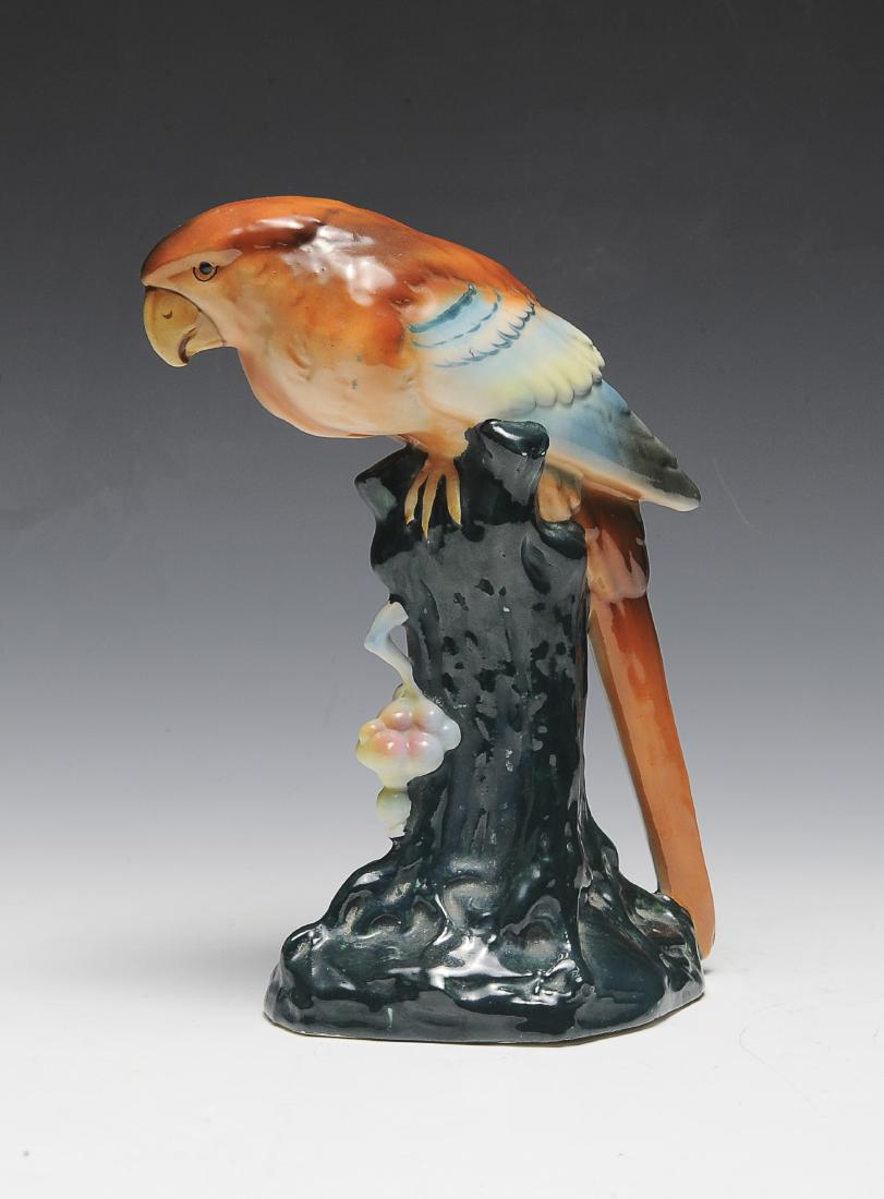 Czech Pottery Parrot Figurine: Multicolored Czech ceramic parrot sitting on perch. Dimensions are: 9" tall. All measurements are approximate. Condition: No noted damage. Excellent. Provenance: The lifetime collection of Linda Racey