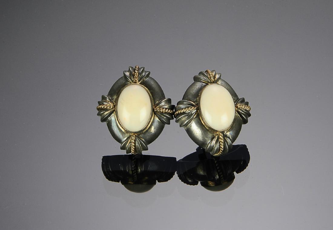 Sterling Silver and Gold Earrings by MAZ: Sterling with 14K gold trim and unknown center stone by MAZ. Omega backs, one omega loop missing. Total weight 49.3 grams (1.58 troy). Dimensions are: 1 3/8" X 1 1/8". All measurements are approximate