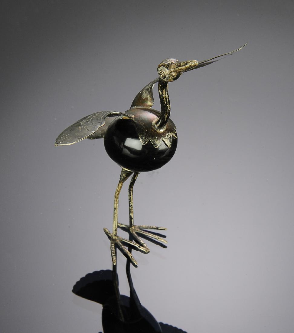 Mexican Silver Bird with Onyx Body: Marked .925 and Mexico on tail, egg shaped onyx body. Total weight: 82.4 grams (2.65 troy). Dimensions are: Largest, 5 1/8" long, 1 3/8" wide". All measurements are approximate. Condition: Very Fine
