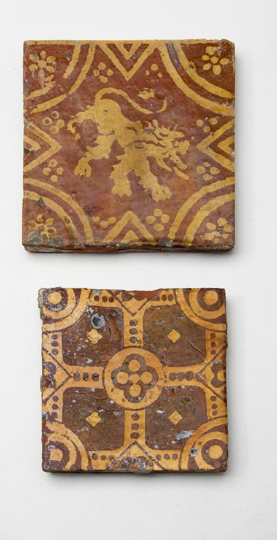Pair of Medieval 15th Century Floor Tiles: Both are earthenware tiles, one with rampant lion, and the other with a geometric pattern. Dimensions are: Largest - 5 3/4" X 5 3/4". All measurements are approximate. Condition: Scattered edge chippi