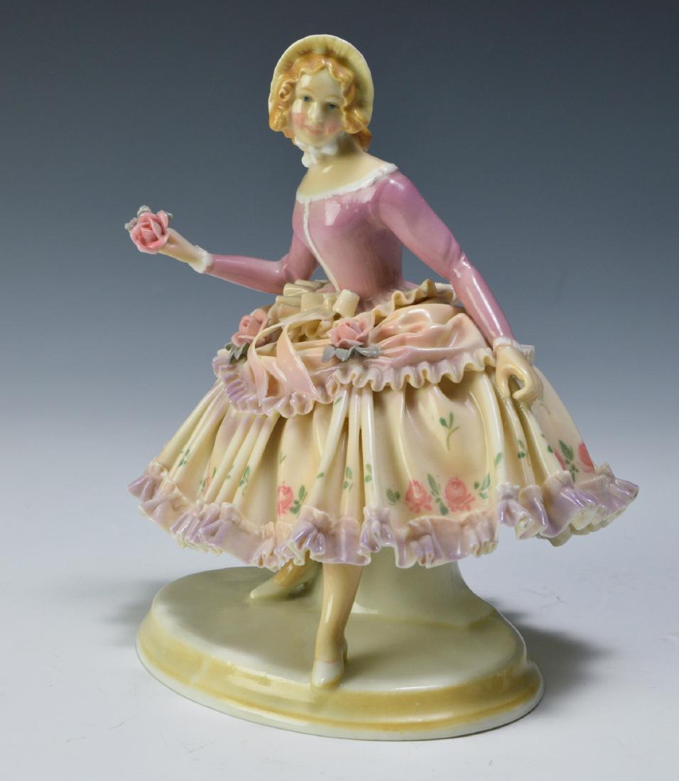 19th Century Volkstedt Porcelain Figure: By the firm of Karl Ens, circa 1888. Dimensions are: 6 7/8" tall, 6 1/4" wide. All measurements are approximate. Condition: No noted damage. Excellent.