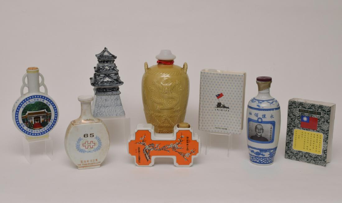 8 Porcelain Liquor Bottles, Taiwan, China Etc.: Group of 8 porcelain, collectors liquor bottles in varying shapes and sizes from China and Taiwan. Some come with original boxes. Dimensions for the largest box are: 11 1/4 inches tall X 6 3/4 inches 