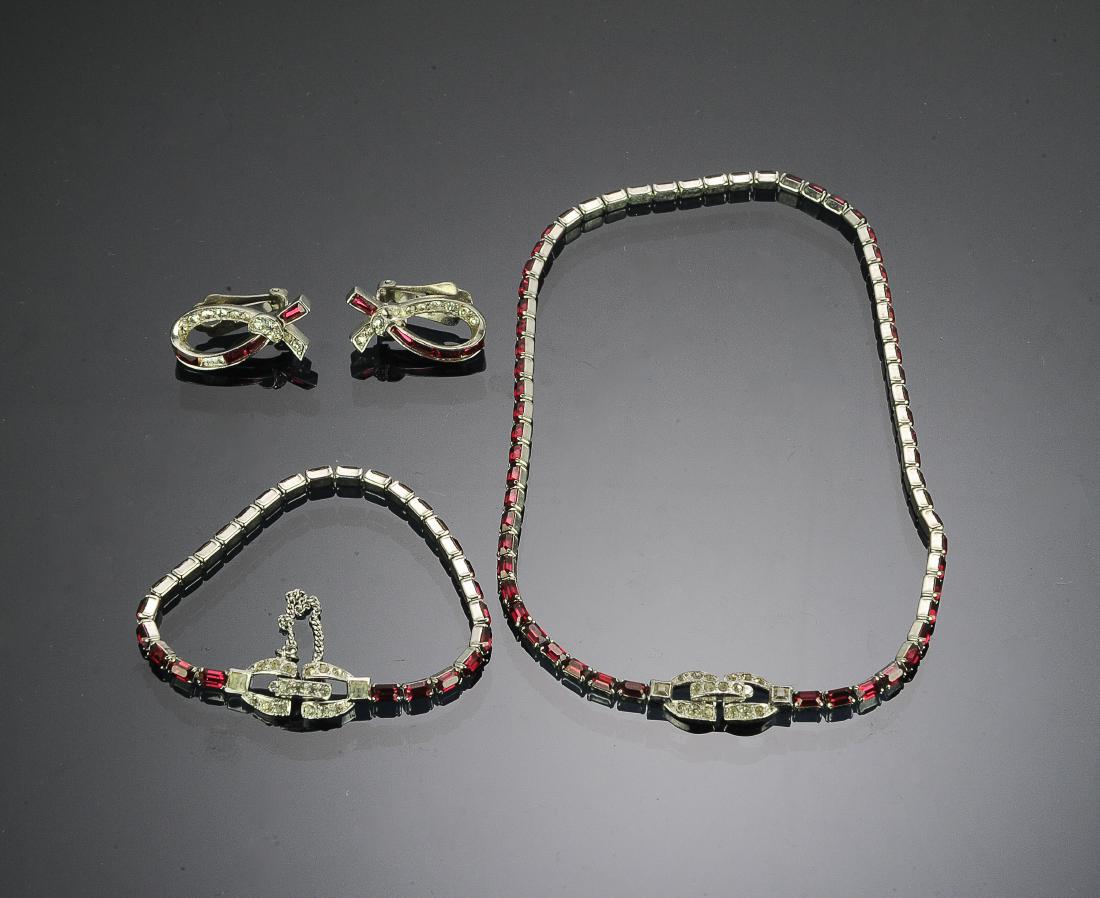 (4) Mazer Bros. 1940's Costume Jewelry: Necklace and matching bracelet with a pair of similar earrings. Dimensions are: necklace - 15" long, bracelet - 7" long. All measurements are approximate. Condition: One earring is missing one red "ge