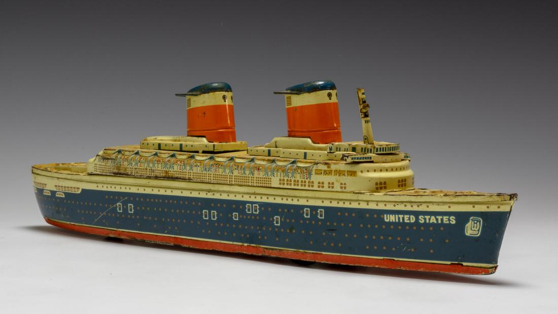Tin SS United States by Yonezawa: Tin litho ship from Japan circa 1960. Dimensions are: 14 1/4" long. All measurements are approximate.