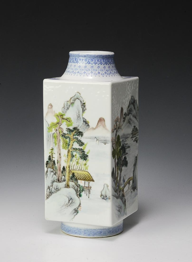 Chinese Porcelain Square Cong Vase, Republic: A Chinese porcelain square cong form vase dating from the Republic period. Each side is decorated with a landscape scene, and the bottom has a 4-character mark. The mouth and foot of the vase have a G