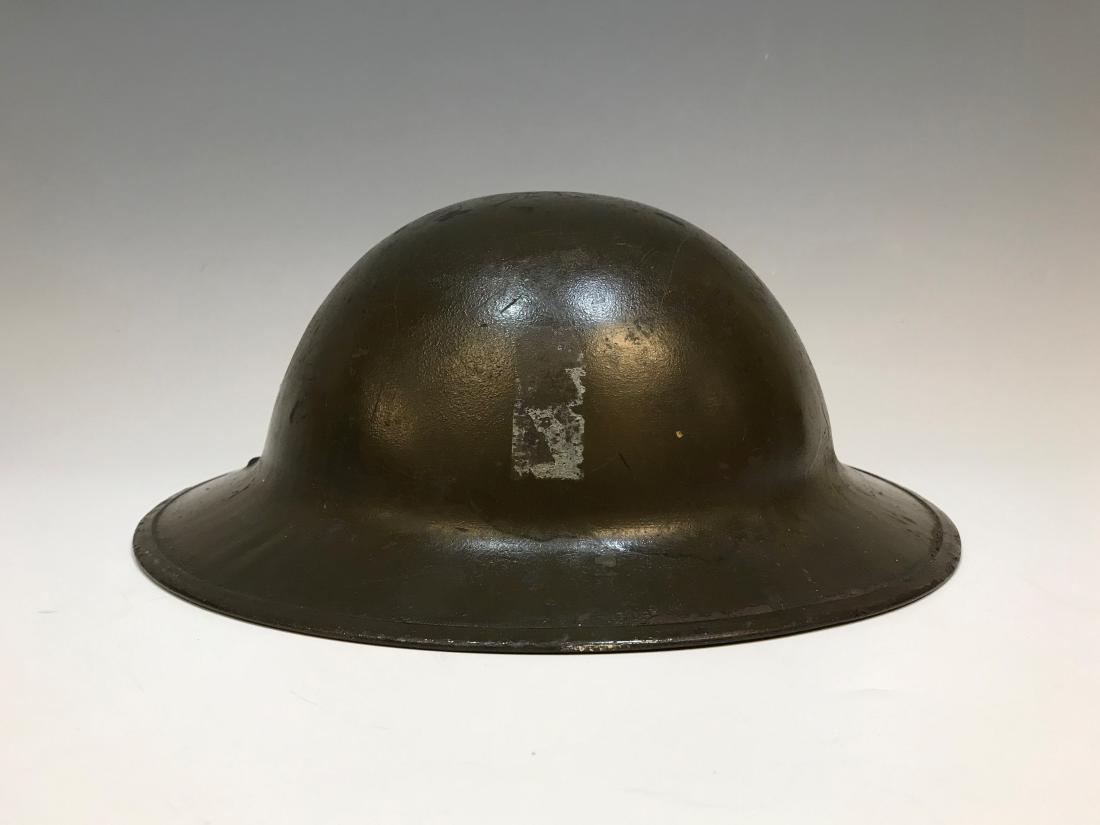 US WWI M1917 Doughboy Brodie Helmet: United States doughboy brodie helmet, model M1917, from World War I. Retains aluminum frame. Dimensions are: 11 3/8" wide X 12 3/8" long X 4 1/2" tall. All measurements are approximate. Condition: Fre