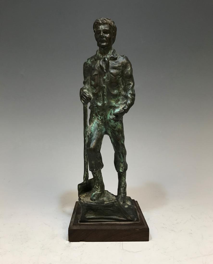 Franco Vianello Bronze Woodsman Lumberjack: Franco Vianello (Italian/America, b. 1937) 1979, bronze sculpture depicting a woodsman or lumberjack shown holding a double-sided axe by the handle. The form mounted to a wooden plinth. The artist's i
